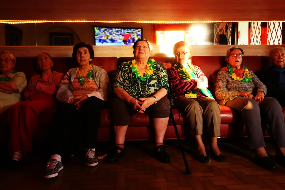 Residents at the Casa das Senorãs old folks home in São Paulo cheer on Brazil vs Mexico