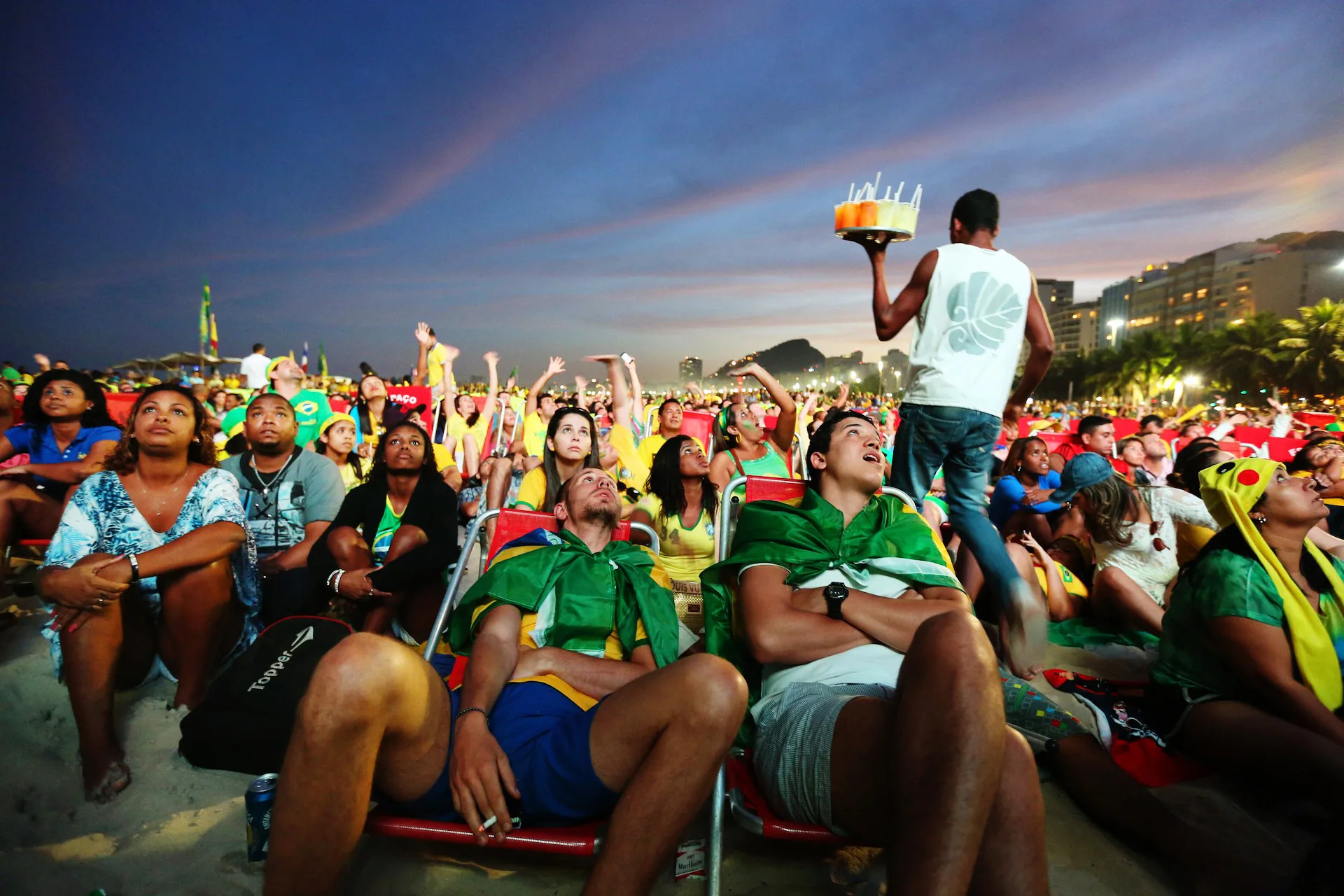 Brazilians and tourists flocked to Copacabana beach to watch Brazil vs Cameroon